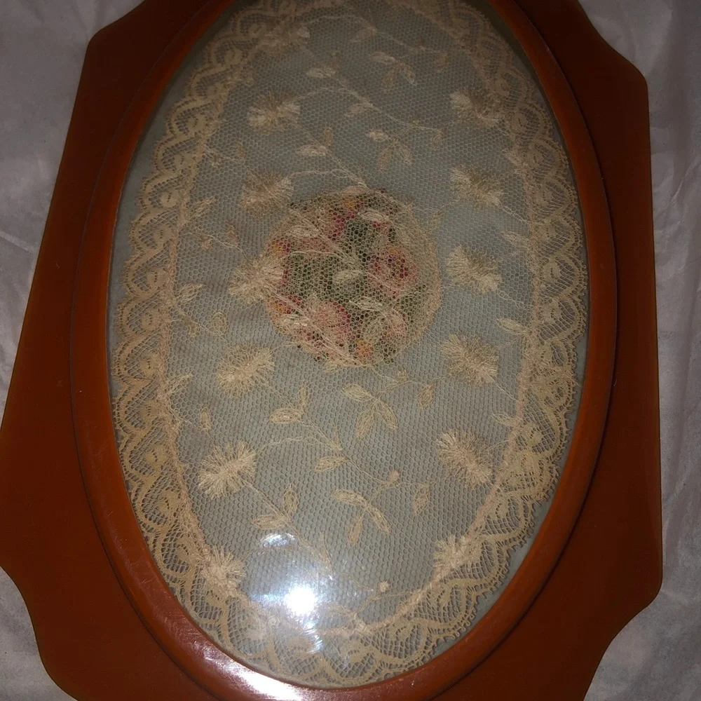 Vintage pearly coral bakelite clear pressed lace tray